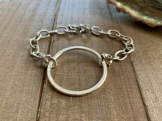 Nellie Pratt Artisan Jewelry - Good Genes- chain statement bracelet: Gold chain with silver circle