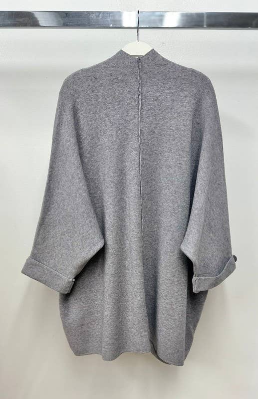- FLUFFY TASSEL FRONT ZIPPER RELAXED FIT CARDIGAN